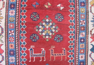 Early Caucasian Long Rug, South Caucasus, Mid 19th century, 50 x 119 inches.  Lots of excellent, natural colors.  Very good condition with losses to the ends and minor repairs. Needs  ...