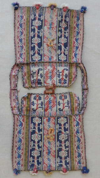 Set of Aymara cargo bags, (alforjas), Bolivia.  Early 19th century or before.  Placed over the head and draping front and back from the shoulders, these double bags are said to  ...