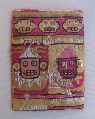 Wari Tapestry Coca Bag.  Peru, Wari Culture, AD 500 - 800.  Unique imagery with Jester-like figures.  Fine and Rare.  Conserved to a backing in Plexiglass case, but could  ...