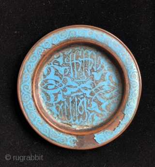 Copper alloy plate with turquoise colored enamel and Islamic script.  Turkestan, 17/18th century.  Size: 4.5 inches in diameter.             