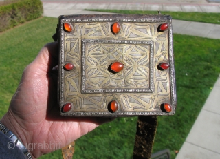 Turkmen Amulet Pouch, Tekke tribes. 19th century.  Leather, fire gilded silver and carnelian.                   