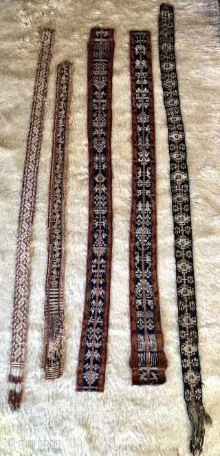 Five 19th century warp-faced woven belts from the high Andes.  Woven by Aymara Indians in the Altiplano region of Bolivia using fine alpaca fiber yarns in a complimentary warp-faced weave.   ...