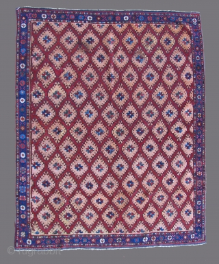 Anatolian Village Rug.  Originally an 18th century piece, now mostly second half of the 20th century.  Size: 58 x 72 inches.  Once a very nice early rug.  Now  ...