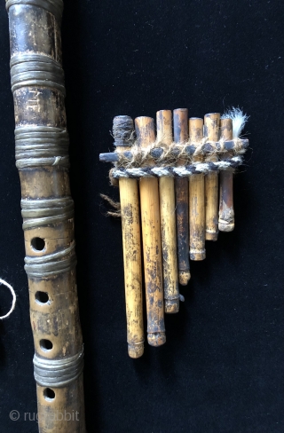 Andean Wind Instruments. For millennia Andean people have been playing wind instruments. Music was a vital part of Andean ritual and ceremony.  Seen here are two Pre-Columbian panpipes and two flutes  ...