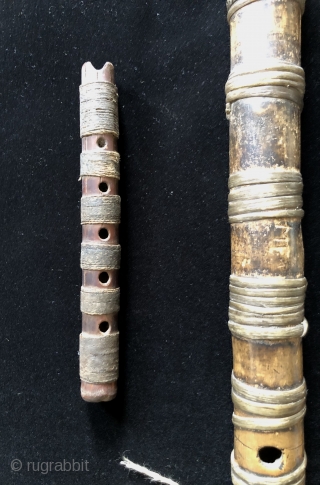 Andean Wind Instruments. For millennia Andean people have been playing wind instruments. Music was a vital part of Andean ritual and ceremony.  Seen here are two Pre-Columbian panpipes and two flutes  ...