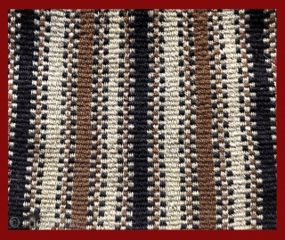 Complete warp-faced patterned Andean coca bag.  A.D. 900 - 1200. The design is primal - made by simply alternating warp yarns to create a "zipper-like" pattern.  This is a way  ...