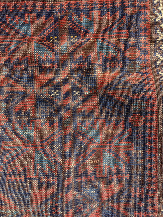 Baluch prayer rug.  19th century. Large and with electric light blues.  Complete and in very good condition. Size: 65 x 40 inches.         