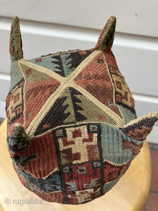 Exceptional and rare Pre-Columbian four cornered hat. Tiwanaku Culture, Bolivia, Chile or Peru. a.d. 600 – a.d. 900. This hat was created in a tight looping structure using fine alpaca yarns. This  ...