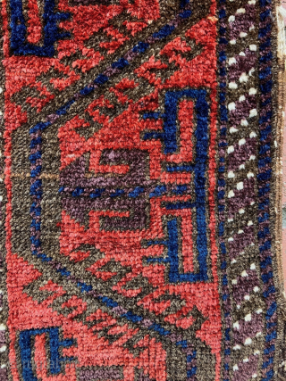 Baluch balisth.  Great border and lustrous wool and good dyes.  Excellent symmetry.  This one satifies.  Size: 19 x 37 inches         