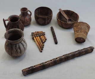 A random selection of interesting, authentic, native artifacts from the Americas - North and South.  Bead and quill work, wind and percussion instruments, ceramics, leather and fabric. All antique, some ancient  ...