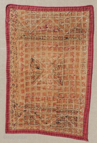 Khirgiz appliqué hanging.  Older than most, this unusual piece has seven different colors of dyed leather used in the appliqué.  It also uses old trade cloth in both wool and  ...