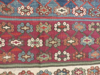 This 19th Century Reyhanli Kilim has beautiful saturated, naturally dyed colors and is in decent condition with some wear and repairs. Size: 64 x 140 inches.  As is condition - Reasonable. 