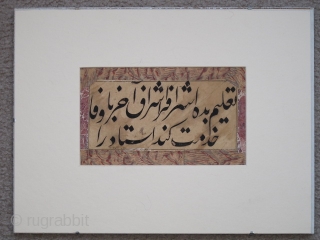 Ottoman calligraphic paper folio, possibly a qit'ah, written in Persian in nasta'liq script with a proverb, "Give to the noble one (sharif)... 
The size of the actual piece is apx. 9"x5". It  ...