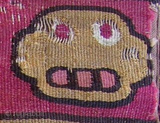 Unique tapestry woven coca bag. Peru, Wari Culture, ad 500 - 800. This small bag has killer imagery with it's Jester-like main figures. One figure appears to be biting his tongue and  ...
