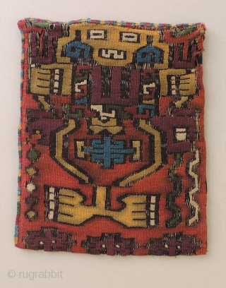 Early Nasca tapestry fragment with human figures.  Re-purposed into a small bag. Great color and iconography.  Size: 8.5 x 7 inches.          