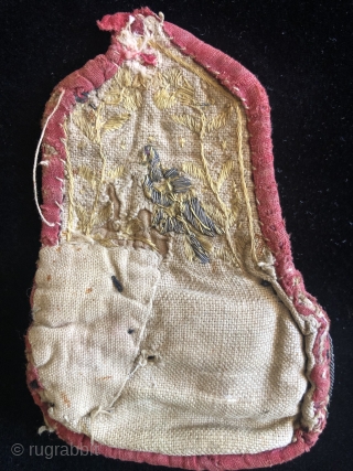 One of a kind small Colonial period pouch. Bolivia or Peru. 18th century possibly earlier. Silver wrapped silk thread embroidery on a silk velvet ground that shows a Spanish (Europeanized) idealization of  ...