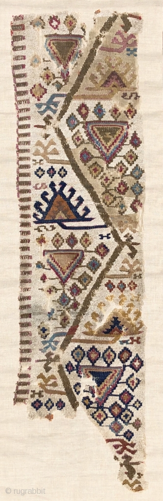 Antique Reyhanli kilim fragment.  Unusual two tone - mixed wool and cotton wefts used as an off-white field or ground color.  There is an animated, almost musical quality to the  ...