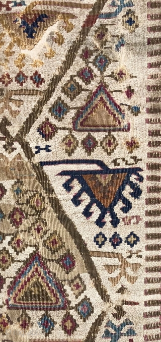 Antique Reyhanli kilim fragment.  Unusual two tone - mixed wool and cotton wefts used as an off-white field or ground color.  There is an animated, almost musical quality to the  ...