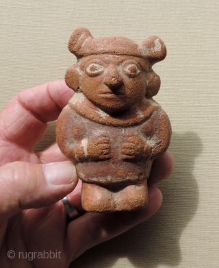 Pre-Columbian Mochi Ceramic Figure.  A.D. 100 - 800.  Rare, small guardian figure with immense charisma and charm. There is something very special about this little being.  Traces of the  ...