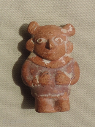 Pre-Columbian Mochi Ceramic Figure.  A.D. 100 - 800.  Rare, small guardian figure with immense charisma and charm. There is something very special about this little being.  Traces of the  ...