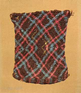 Another two thousand year old bag.  Paracas, South Coast Peru.  Archaic pre-loom technology where design imitates structure.  Size: 8 x 6.5 inches.        