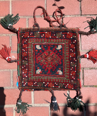 Mint condition, small,  double-sided Baluch bag.  Full pile on both faces of the bag. All dyes natural.  Brilliant reds and greens.  Size: 14 x 14 inches without tassels.  ...
