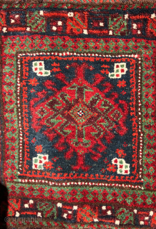 Mint condition, small,  double-sided Baluch bag.  Full pile on both faces of the bag. All dyes natural.  Brilliant reds and greens.  Size: 14 x 14 inches without tassels.  ...