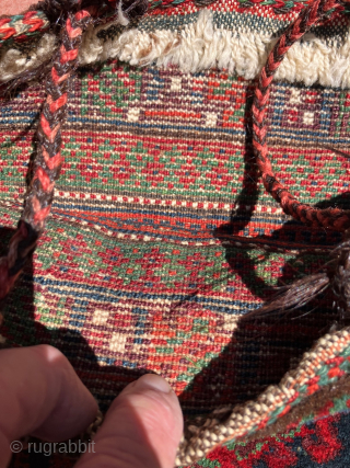 Mint condition, small,  double-sided Baluch bag.  Full pile on both faces of the bag. All dyes natural.  Brilliant reds and greens.  Size: 14 x 14 inches without tassels.  ...