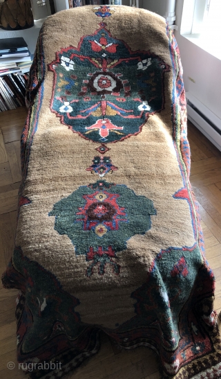 This is a very good, lush, old Kurdish rug of the 19th century. It has full pile throughout with a beautiful natural camel hair field. Great colors including very interesting shades of  ...