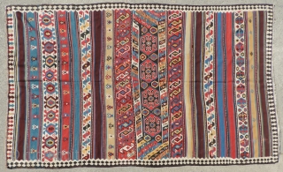 Azerbaijan Kilim. This is a 19th century weaving that has an unusual collection of designs and a good variety of clear, pleasing, natural dyed colors. It is in very good condition and  ...