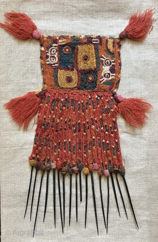 Rare and primitive Pre-Columbian textile pendants. Researching the literature has yielded less than seven of this kind of textile and each example is unique as regards iconographic content.  They are indeed  ...