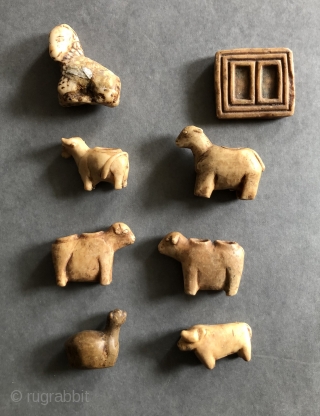 19th century carved alabaster fetishes used in animal increase rites in the Altiplano region of Bolivia and Southern Peru. Stone figures such as these were carved by Callawaya - traditional Aymara healers  ...