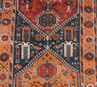 East Anatolian rug with medallions. 1st half of the 19th century or before. Three serrated medallions on a blue field. Missing minor border at top and bottom. Original selvedges.  Beautiful even  ...