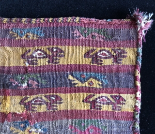 Captivating little Pre-Columbian bag.  Very unusual style with edge finishes like some provincial Nasca/Wari textiles.  A.D. 600 - 1200.  Stylized zoomorphic figures travel in rows across the width of  ...