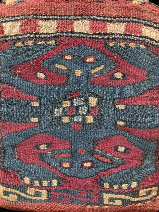 Small two-sided tapestry bag from the Nasca/Wari period.  A.D. 400 – 700.  The iconography is that of a double-headed anthropomorphic or zoomorphic being with arms and/or legs akimbo.  Double–headed  ...