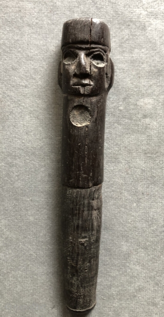 Carved Wari period figure with a four-cornered hat. This beautifully detailed, small Pre-Columbian wood carving was probably a stopper for some kind of container either wood, stone or ceramic.  Such a  ...