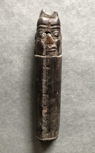 Carved Wari period figure with a four-cornered hat. This beautifully detailed, small Pre-Columbian wood carving was probably a stopper for some kind of container either wood, stone or ceramic.  Such a  ...