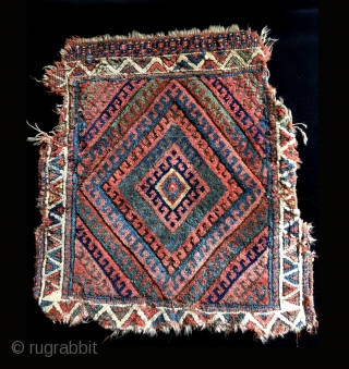 Bold Jaff Kurd bag face with single hooked diamond medallion field. Old and fragmented with good color.  Size 23 x 24 inches.          