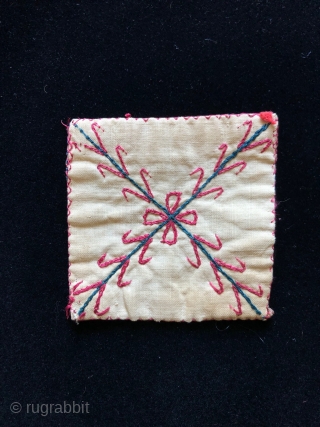 Assortment of one dozen small Yomut Turkmen squares from various wedding camel trappings.  Largest 5 x 5 inches.  Smallest 2.5 x 2.5 inches.        