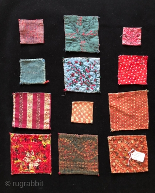 Assortment of one dozen small Yomut Turkmen squares from various wedding camel trappings.  Largest 5 x 5 inches.  Smallest 2.5 x 2.5 inches.        