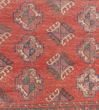  This small Middle Amu Daria Turkmen carpet is of unknown tribal origin, but has the look of a Salor Turkmen weaving. The spacing of the guls is generous and lends a  ...