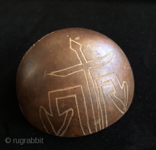 Seven incised gourd bowls. I bought these years ago at a show in New York (I think?) as shaman's cups for the ritual drinking of intoxicants.  I cannot recall anything else  ...