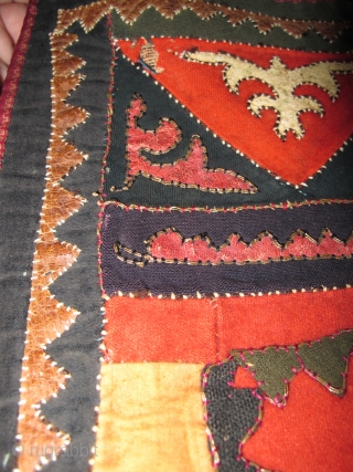 Central Asian Kirghiz small Applique: leather, wool, some metal thread and perhaps cotton on a block-printed back, silk stitching. 24" x 16"           