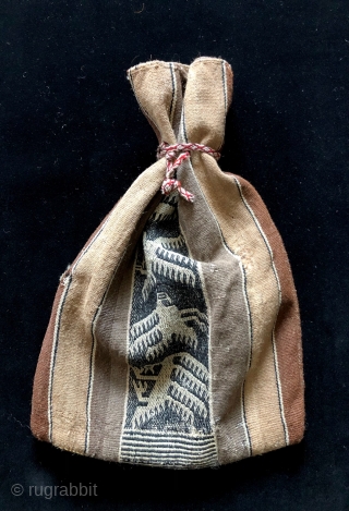 Jalq'a bag in natural, un-dyed alpaca fiber. Bolivia, early 20th century. Weavings of the indigenous Jalq'a people from the Potolo region almost always have very strong synthetic reds, pinks and black dyes  ...