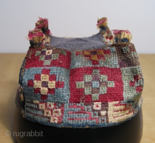Of all the Wari pile hats I've had over the years this simple stepped diamond designed example remains among my personal favorites. This textile is all about the color and the fiber.  ...