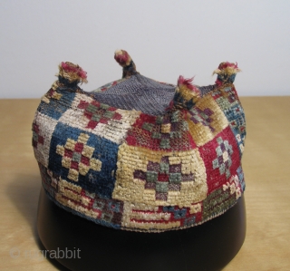 Of all the Wari pile hats I've had over the years this simple stepped diamond designed example remains among my personal favorites. This textile is all about the color and the fiber.  ...