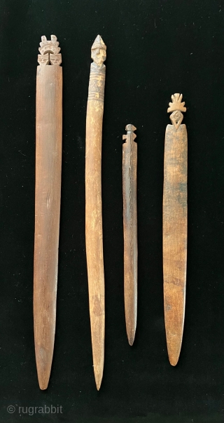 Tools of the trade.  Pre-Columbian weaving tools including a loom with partly completed weaving, spindles, llama bone weft packing implements and weaving swords.  All more than 600 years old.   ...