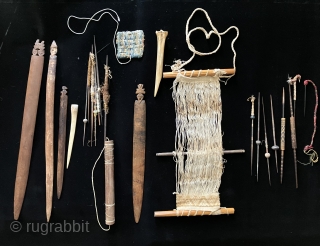 Tools of the trade.  Pre-Columbian weaving tools including a loom with partly completed weaving, spindles, llama bone weft packing implements and weaving swords.  All more than 600 years old.   ...
