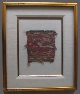 Colonial Period Bag, Peru or Bolivia, 18th century. Tapestry weave.  Alpaca fiber.  Size 7 x 6 inches.  Framed size: 17.25 x 20.25 inches.       