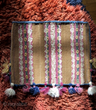 Three Andean coca bags woven by the indigenous Aymara people. The Aymara are a pastoral group of indians that live in the high Altiplano region of Bolivia at about 12,500 feet above  ...